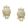 Pair of gold earrings with jasper and diamond accents on a white background